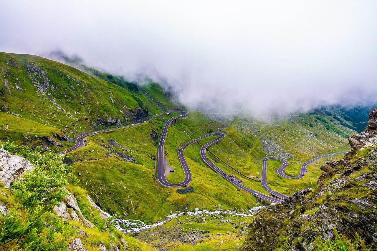 A mountain road with switchbacks Image by Madalina Gogoasa from Pixabay